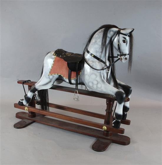 A Robert Foster of Hartfield dapple grey rocking horse, dated 1997, length 5ft height 4ft