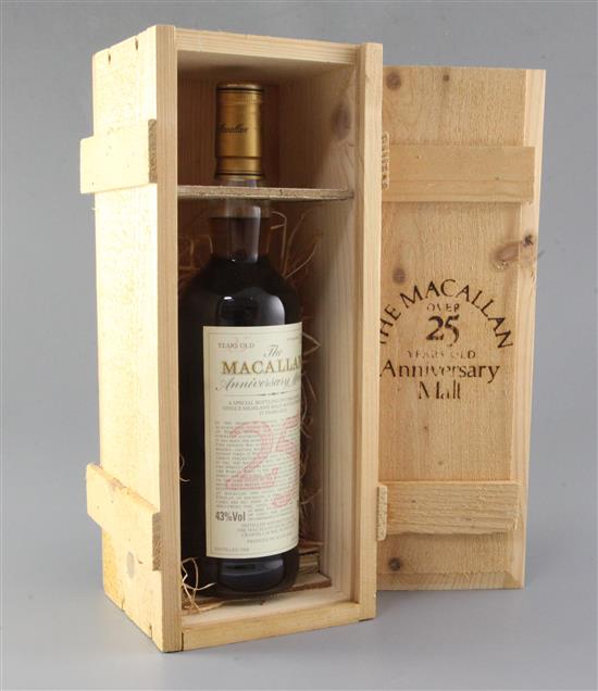 A bottle of The Macallan 25 year old anniversary malt,