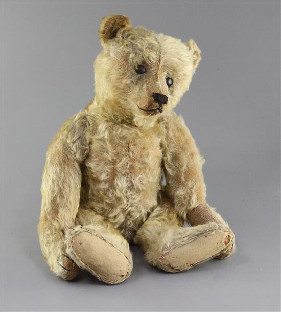 A Steiff centre seam bear, c.1908, replaced paw pads, hair loss to body, arms and legs, 20in.