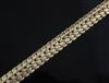 An early 1970's textured 9ct gold woven link bracelet, 19.4cm.                                                                         