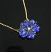 A 9ct gold, lapis lazuli and diamond set flower pendant, on a 9ct gold chain, pendant 24mm.                                            
