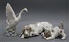 A Lladro figure of a recumbent bloodhound, another of a playful puppy and a Nao figure of a swan                                       