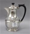 A silver hot water pot, Viners Ltd, Sheffield, 1936, gross 18 oz.                                                                      