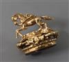 A 9ct gold and carnelian fob surmounted with a horse, 26mm.                                                                            