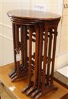 A nest of four Edwardian inlaid mahogany oval tables W.52cm                                                                            