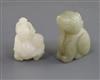 A Chinese white jade 'two boys' carving and a celadon jade lion-dog, H. 3.7cm and 4.4cm                                                