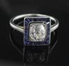 A 1920's/1930's platinum, diamond and sapphire cluster ring, size K.                                                                   