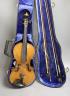 An early 20th century French or English violin with two bows, each stamped                                                                                                                                                  