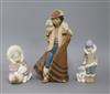 Three Lladro figures: shepherd boy and two Eskimo children with bears tallest 24cm                                                     