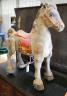 A vintage Mobo painted tinplate toy sit on horse, length 66cm                                                                                                                                                               