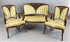 A French Art Nouveau mahogany three piece salon suite, in the manner of Majorelle, settee W.4ft 2in. H.3ft 4in.                        