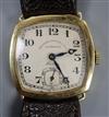 A gentleman's late 1920's 18ct gold manual wind wrist watch, retailed by Boodle & Dunthorne, on associated strap.                      