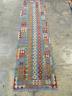 An Anatolian design Kelim polychrome runner, approx. 300 x 84cm                                                                                                                                                             