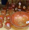 A pair of Carnival glass 'crucifix' candlesticks and a collection of other marigold Carnival glass,                                    