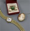 A lady's Mappin and Webb wrist watch, a yellow metal and emerald cluster dress ring, a cameo brooch and pair of ear studs.             