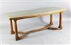 Sir Edward Brantwood Maufe (1882-1974). A walnut Swedish green marble topped refectory table, made by Crossley and Brown, L.6ft 6in.   