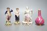 A Minton porcelain figure of a lady seated with a dog c.1830, a pair of Derby figures of a girl and a boy with a dog and a sheep, and a Bloor Derby vase                                                                    