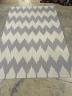 An Ikat contemporary dhurrie, approx. 200 x 160cm                                                                                                                                                                           