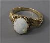 A 9ct? gold and white opal dress ring, size I.                                                                                         