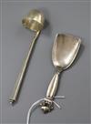 A 1930's Georg Jensen sterling silver cream ladle and a Georg Jensen silver caddy spoon.                                               