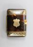 A Victorian gold-mounted tortoiseshell purse, circa 1900, 7cm                                                                                                                                                               