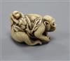 A 19th century Japanese ivory monkey group netsuke                                                                                     