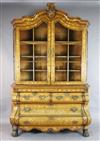 A 19th century Dutch floral marquetry and oak bombé base display cabinet, W.5ft D.1ft 8in. H.7ft 8in.                                  