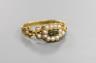 A George IV yellow metal and seed pearl set mourning ring(a.f.), with engraved inscription, 'Marion Eliz. Taylor, Obt. 4th Nov, 1825 at. 21', size O, gross weight 3 grams.                                                 