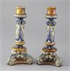 A pair of Doulton Lambeth stoneware candlesticks, decorated by Frank Butler, 20cm                                                      