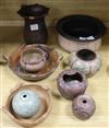 A collection of Brazilian incised terracotta and carved wood bowls and vases diameter 29cm                                             