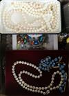 A quantity of assorted costume jewellery.                                                                                              