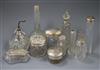 Twelve assorted silver mounted glass toilet jars, etc.                                                                                 