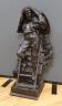 A cast spelter figure of a fireman performing rescue of a child, 81 cms high.                                                                                                                                               