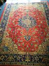 A Turkish carpet 330cm x 245cm                                                                                                         