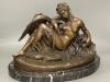 A cold cast resin bronze of Leda and the swan, on marble base, length 48cm                                                                                                                                                  