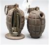 A deactivated WWII hand grenade and similar with cut out to show workings                                                              