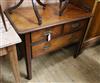 A mahogany lowboy with recessed brass handles W.94cm                                                                                   