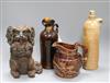 A Doulton whiskey jug, a terracotta dog tobacco jar, a flagon and a jug                                                                