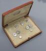 An early 20th century 18ct & Pt, mother of pearl and sapphire set octagonal part dress stud set (one stud missing)                                                                                                          