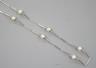 A modern Italian 750 white metal baton link and cultured pearl set necklace, 58cm, gross weight 12.7 grams.                                                                                                                 