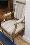 A pair of late 19th century French fruitwood fauteuil                                                                                  