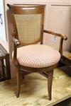 A revolving caned chair                                                                                                                