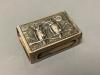 A late Victorian silver matchbox holder, embossed with two owls and inscribed 'Oswald Fitch, London', Birmingham, 1897, 42mm.                                                                                               