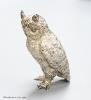 A modern free standing miniature silver model of an owl, C.F.H & Co, London, 1994, height 8cm, 195 grams.                                                                                                                   