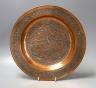 A copper and silver Islamic-style inlaid dish - 32cm diameter                                                                                                                                                               