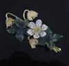 A 1960's white and yellow gold, jadeite and diamond set floral spray brooch, 65mm.                                                     