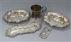 A pair of silver bonbon disher, a silver pin tray, a Victorian silver christening mug and a silver card case.                          