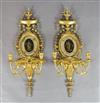 A pair of Hepplewhite style giltwood and gesso girandoles, W.1ft 1in. H.3ft 1in.                                                       