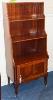 A Sheraton revival inlaid mahogany waterfall bookcase, 114.5 cm height, 51 cm wide, 30.5 cm deep                                                                                                                            