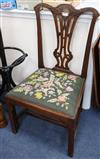 A set of eight dining chairs with tapestry upholstered seats, (six and two carvers)                                                    